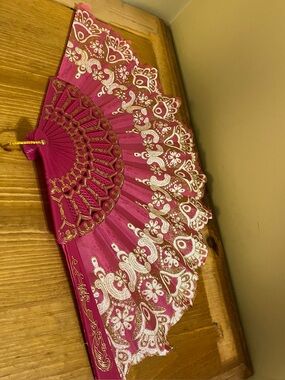 Hot pink w/ white flowers and golden glitter design Style Hand held fan 15 “